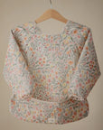 BIB WITH SLEEVES - PASTEL BLOOMS