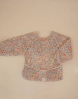 BIB WITH SLEEVES - PASTEL BLOOMS