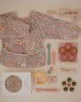 BIB WITH SLEEVES - PASTEL BLOOMS
