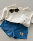 Smiling woven shorts - baby