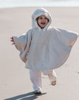 WINTERPONCHO - CREAM 9m-3Y
