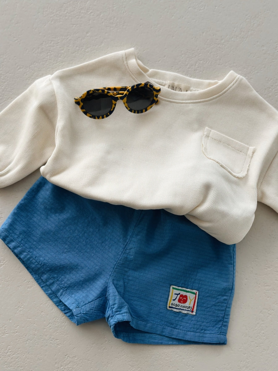 Smiling woven shorts - baby