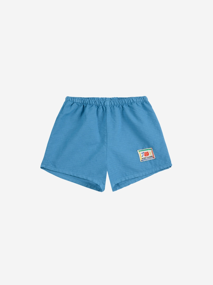 Smiling woven shorts - baby