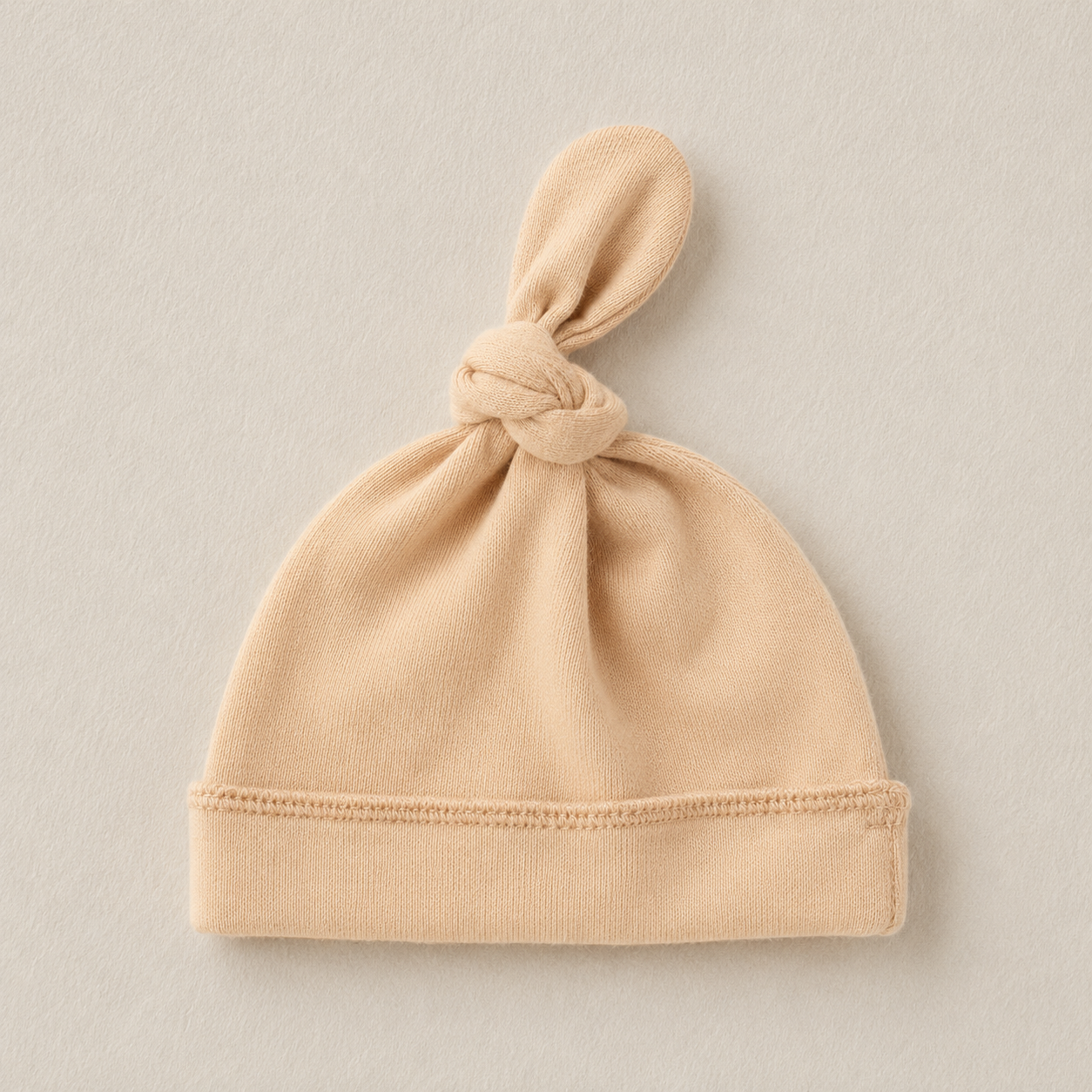 BABYMUTS GEKNOOPT - Sand