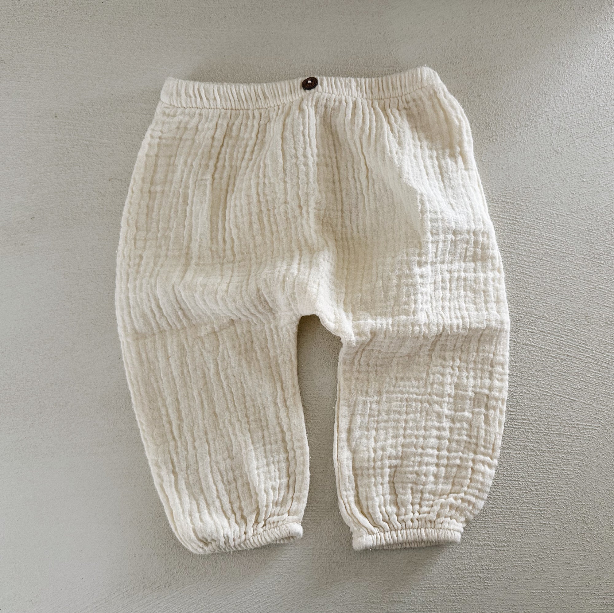 WOVEN MUSLIN PANTS - 9M
